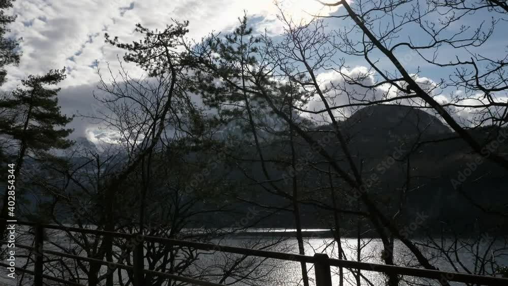 Mountain Lake Lucerne. Alps Switzerland Europe. View out of Car Moving on Highway Quay. Slow motion Mountain Lake Lucerne. Alps Switzerland Europe. View out of Car Moving on Highway Quay. Slow motion