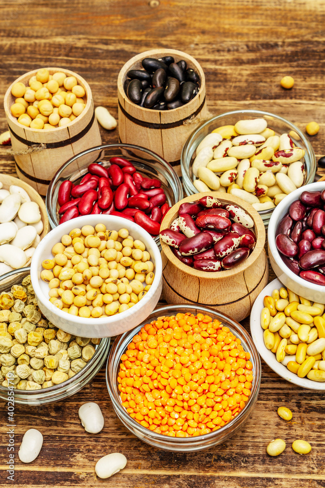 Set of various dry legumes in bowls as indispensable protein for a healthy life