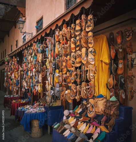 Colorful handmade leather slippers babouches on a market souk in the medina of Marrakech, Morocco