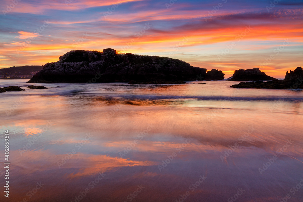 Naklejka premium Sunset from Ris beach, in Noja, Cantabria, Spain.