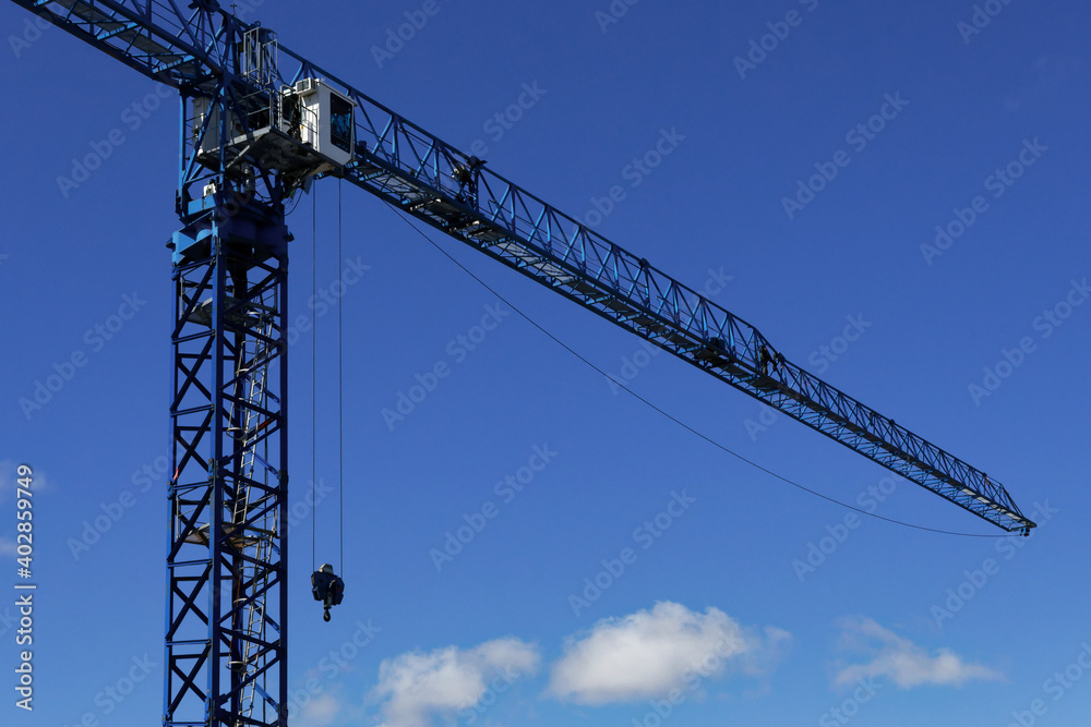 Construction crane and blue sky in Montreal