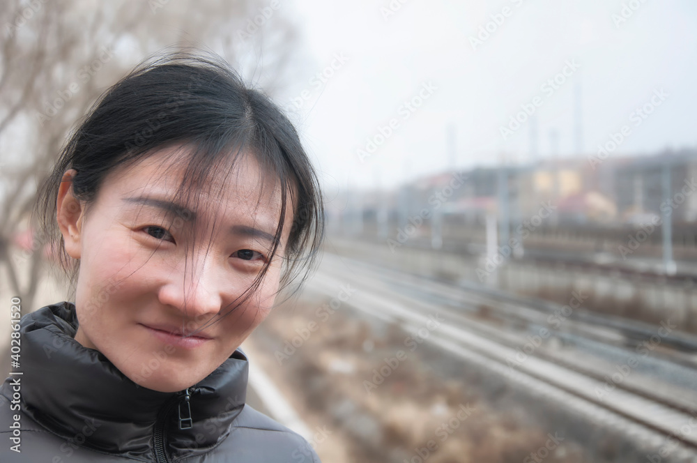 chinese woman traveling near railroad yard zhaodong china chinese woman traveling near railroad yard zhaodong china