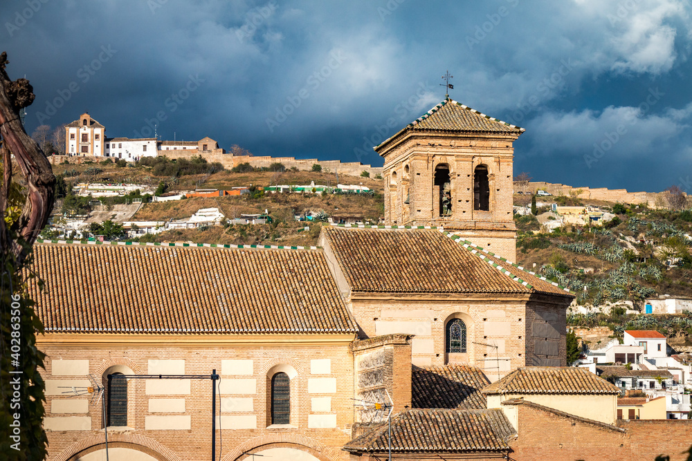 church in old town of granada, spain, dramatic sky, thunderstorm