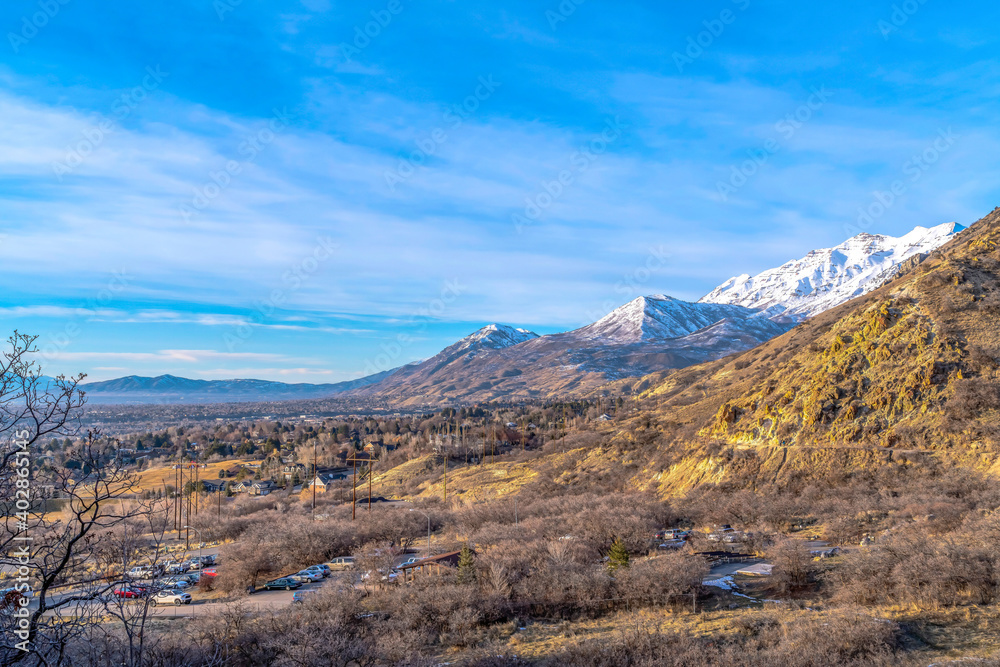 Spectacular mountain landscape with snowy peaks in winter under vivid blue sky Spectacular mountain landscape with snowy peaks in winter under vivid blue sky