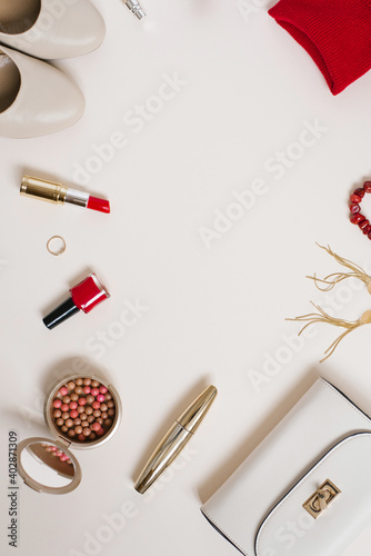 Still life of a fashionista. Women's cosmetic background. Flat lay for Valentine's Day. Cosmetics and clothing blogger for the spring festival. Copying a space