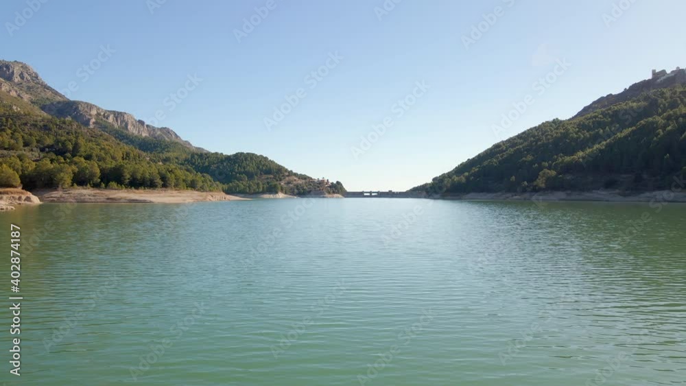 Low aerial view of the Guadalest reservoir in Alicante province, Spain. Low aerial view of the Guadalest reservoir in Alicante province, Spain.
