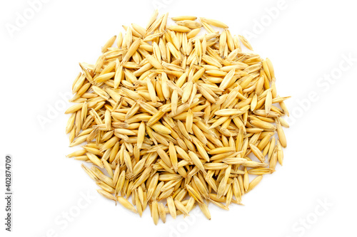 Oat seeds are isolated on white, top view. Oat seeds isolated on a white background. Oat grains isolated on white background, top view. Pile of oat seeds. Avena grain on a white background.