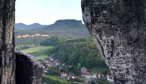 Blick durch die Felsen der Bastei zum Lilienstein photo