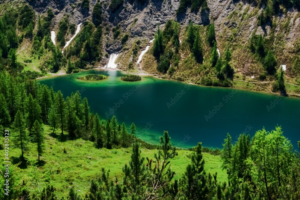 amazing green blue mountain lake in the summer