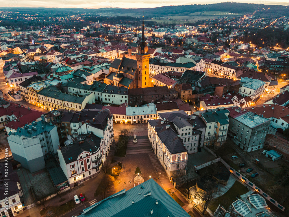 Old Town, City Square and Cathedral Church in Tarnow, Poland. Aerial Drone Skyline at Twilight