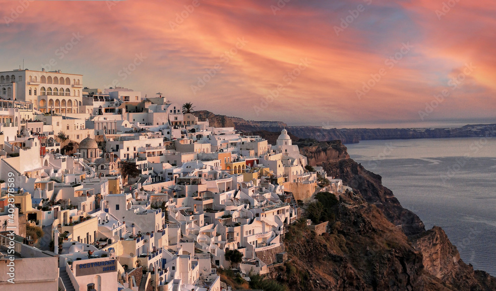 Sunset over Fira town in Santorini Cyclades Greece