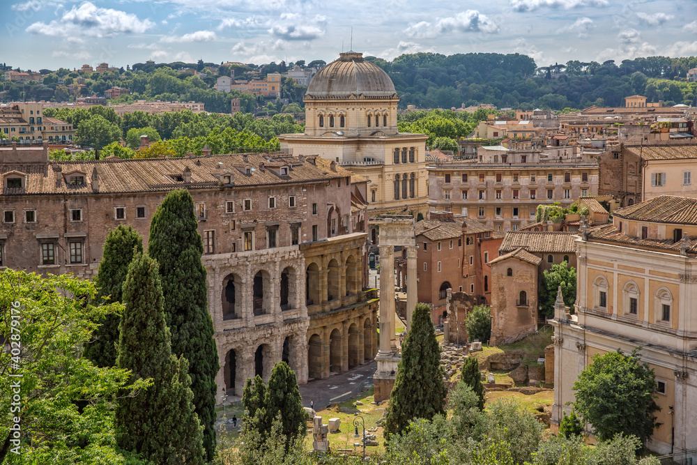 Scenic view of ancient ruins of the Rome city. View of the ruins of the Teatro di Marcello in Rome city center. View of old beautiful architecture of Rome city, Italy
