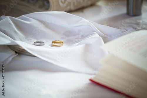wedding rings on a pillow
