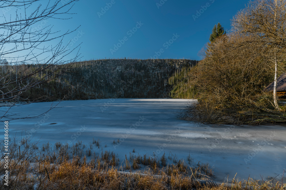 Plesne lake with ice and snow in winter beautiful sunny fresh day