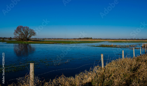 Vend  e  France  January 2  2021  the marshes of blue colors are frozen  winter is here  a superb day with a magnificent sky  not far from Challans.  