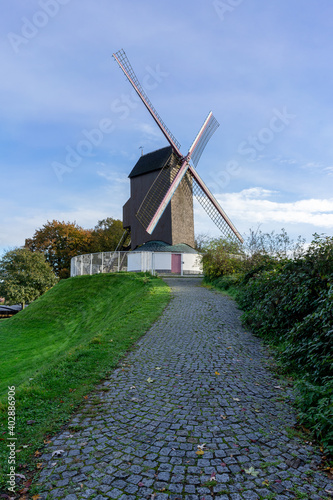 Old flour windmill in Bruges, Belgium