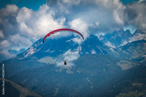 paraglider in the mountains, alps, schladming, austria