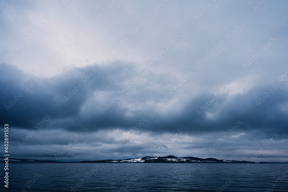 storm clouds over the lake mjøsa