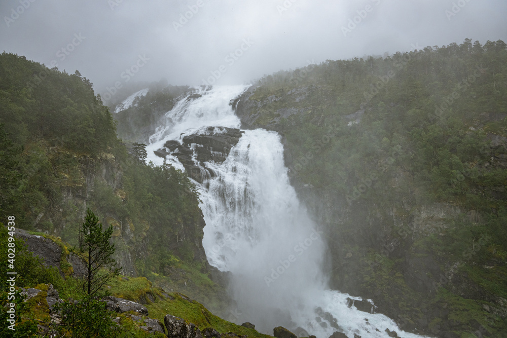Nyastolfossen in fog from the waterfalls of Husedalen
