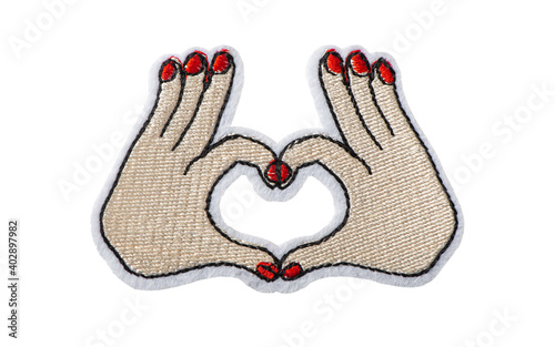 Hands making heart shape, embroidered batch isolated on white background