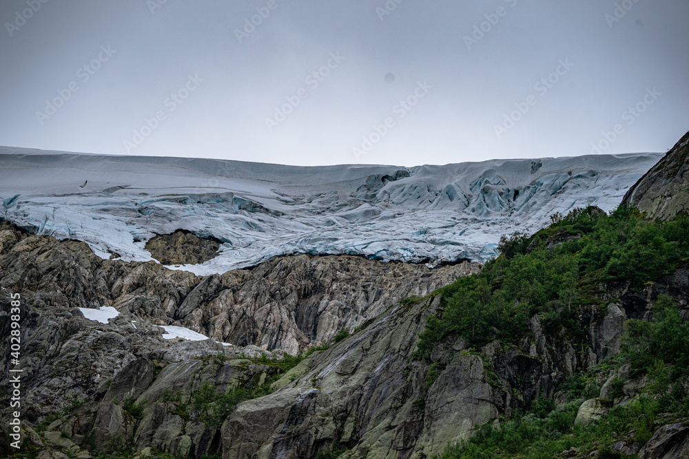 Buerbreen glacier with rocks around it