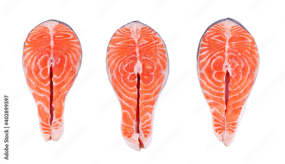 Three salmon steaks, fresh fish slice, trout on white isolated background Three salmon steaks, fresh fish slice, trout on white isolated background