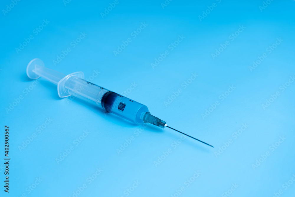 Syringe with coronavirus vaccine and a chip inside the vaccine ...