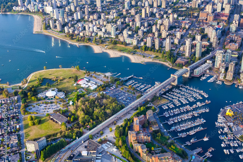 Fototapeta premium Aerial Photography of False Creek in Downtown Vancouver, British Columbia (BC), Canada, on a sunny sunset. Modern City on the Pacific West Coast.