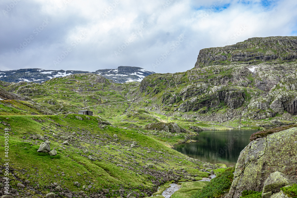 Rocky landscape with snow fields in Norway