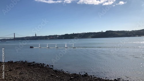 Sailing boat navigating in Tejo River