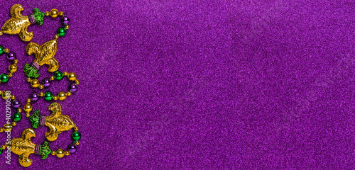 Stampa su tela Carnival decoration Mardi gras beadsglitter violet background