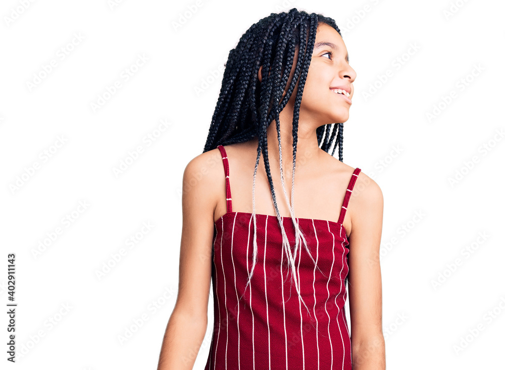 Naklejka premium Cute african american girl wearing casual clothes looking away to side with smile on face, natural expression. laughing confident.