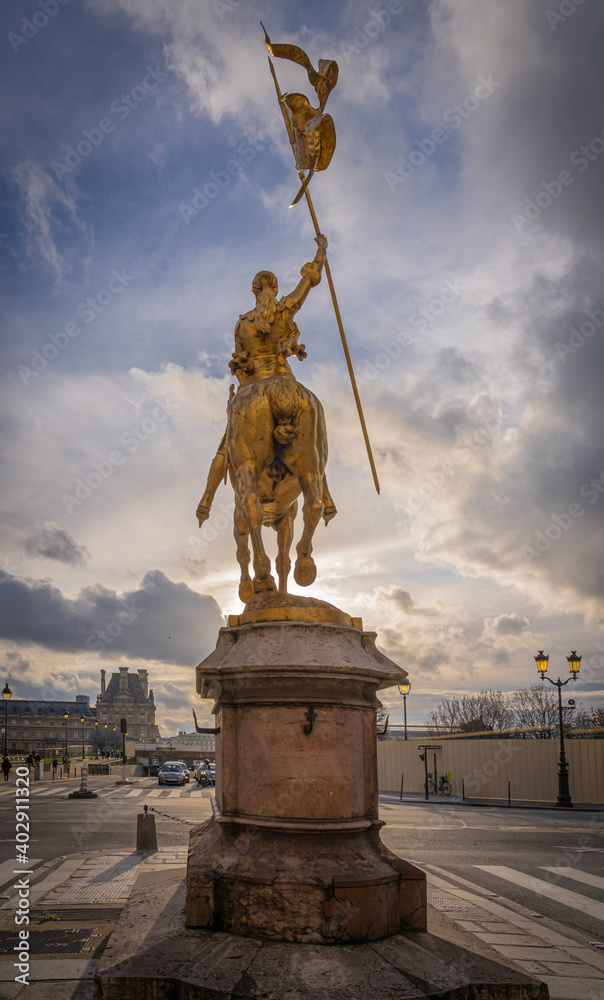 Obraz premium Paris,France - 12 30 2020: The Statue of Joan of Arc Paris from Pyramids Square at sunset