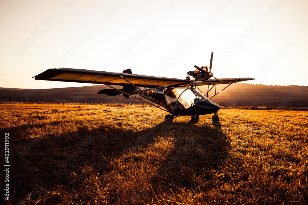 Fototapeta premium hang glider at sunset