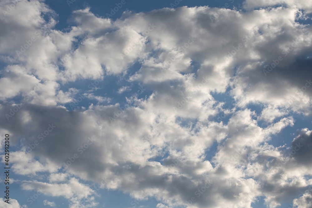 Cloudscape full of white fluffy cummulus clouds