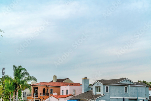 Cloudy sky over houses in scenic coastal neighborhood of Long Beach California