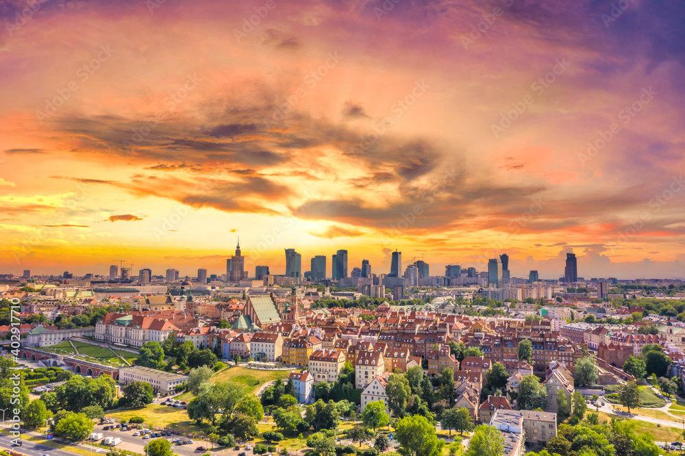 Aerial panorama of Warsaw, Poland  over the Vistual river and City center in a distance. Sunset sky