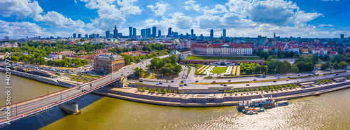City skyline background. Aerial view of Warsaw capital city of Poland. From above, city view with night sky. Panorama of Warsaw cityscape. Europe. Aerial view. Clouds on the sky