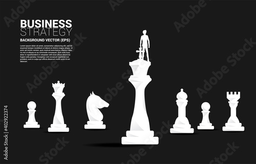 Silhouette of businessman on chess piece king. Business Concept of strategy planning and success