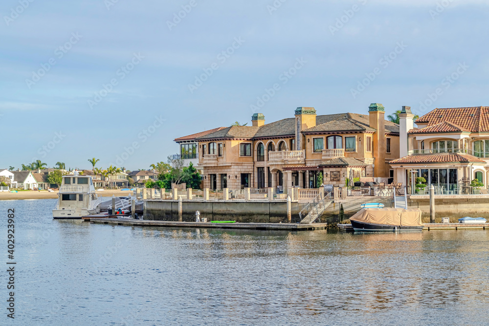 Boats and private yachts of houses overlooking the sea in Huntington Beach CA
