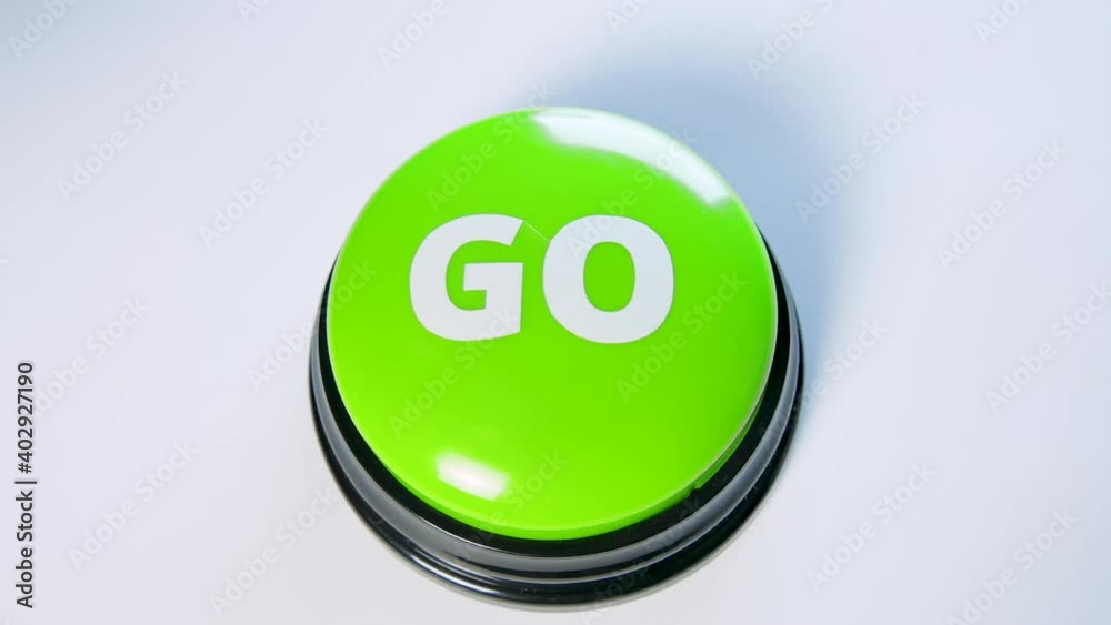 Woman pushing Go button with her finger, close up. Starting a fun game. Concept of starting something new, launching a startup. Just press start. Motivation to begin, make the first move. Ready to go!