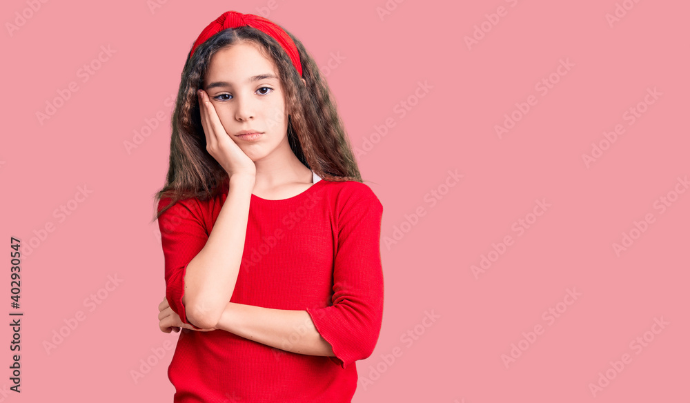 Cute hispanic child girl wearing casual clothes thinking looking tired and bored with depression problems with crossed arms. Cute hispanic child girl wearing casual clothes thinking looking tired and bored with depression problems with crossed arms.