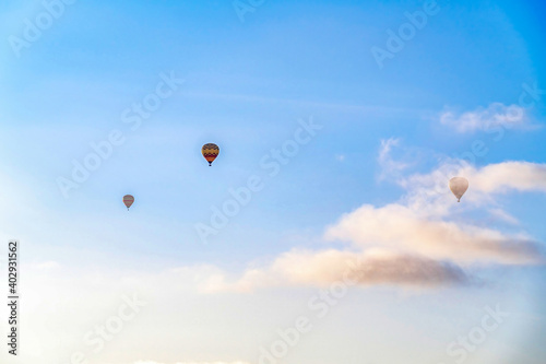 Balloons against blue sky and clouds on a sunny day in San Diego California