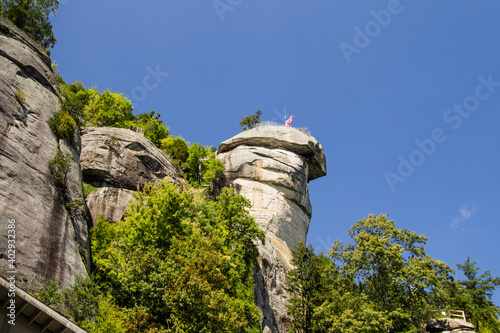 Chimney Rock at Chimney Rock State Park in North Carolina is a 315 foot monolith in the Blue Ridge Mountains. photo