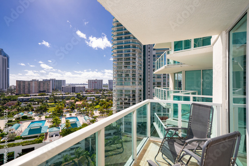 Fototapeta Apartment condominium flat balcony with view of coastal buildings nice scene
