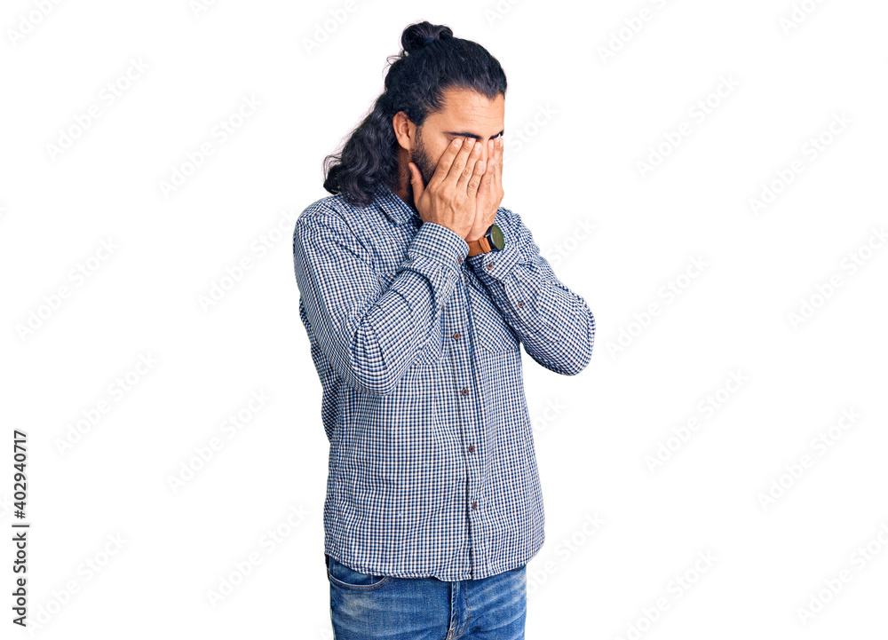 Young arab man wearing casual clothes rubbing eyes for fatigue and headache, sleepy and tired expression. vision problem Young arab man wearing casual clothes rubbing eyes for fatigue and headache, sleepy and tired expression. vision problem