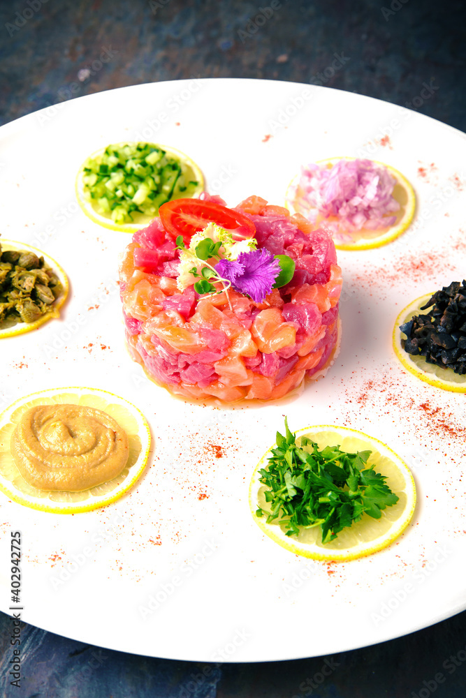 Fresh Salmon and Tuna tartare. Italian restaurant. Menu. Free space for text Fresh Salmon and Tuna tartare. Italian restaurant. Menu. Free space for text