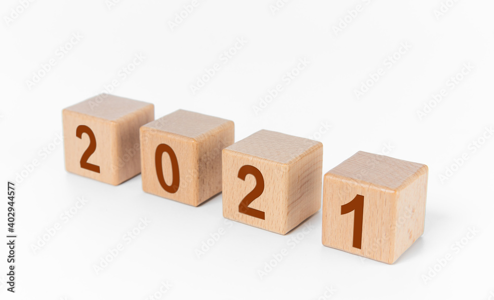 The number 2021 is printed on the building block The number 2021 is printed on the building block