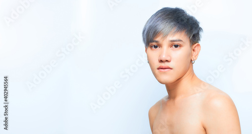 Healthy and beautiful young man on an isolated background.