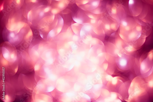 Shimmering blur spot light on pink color background, Christmas concept